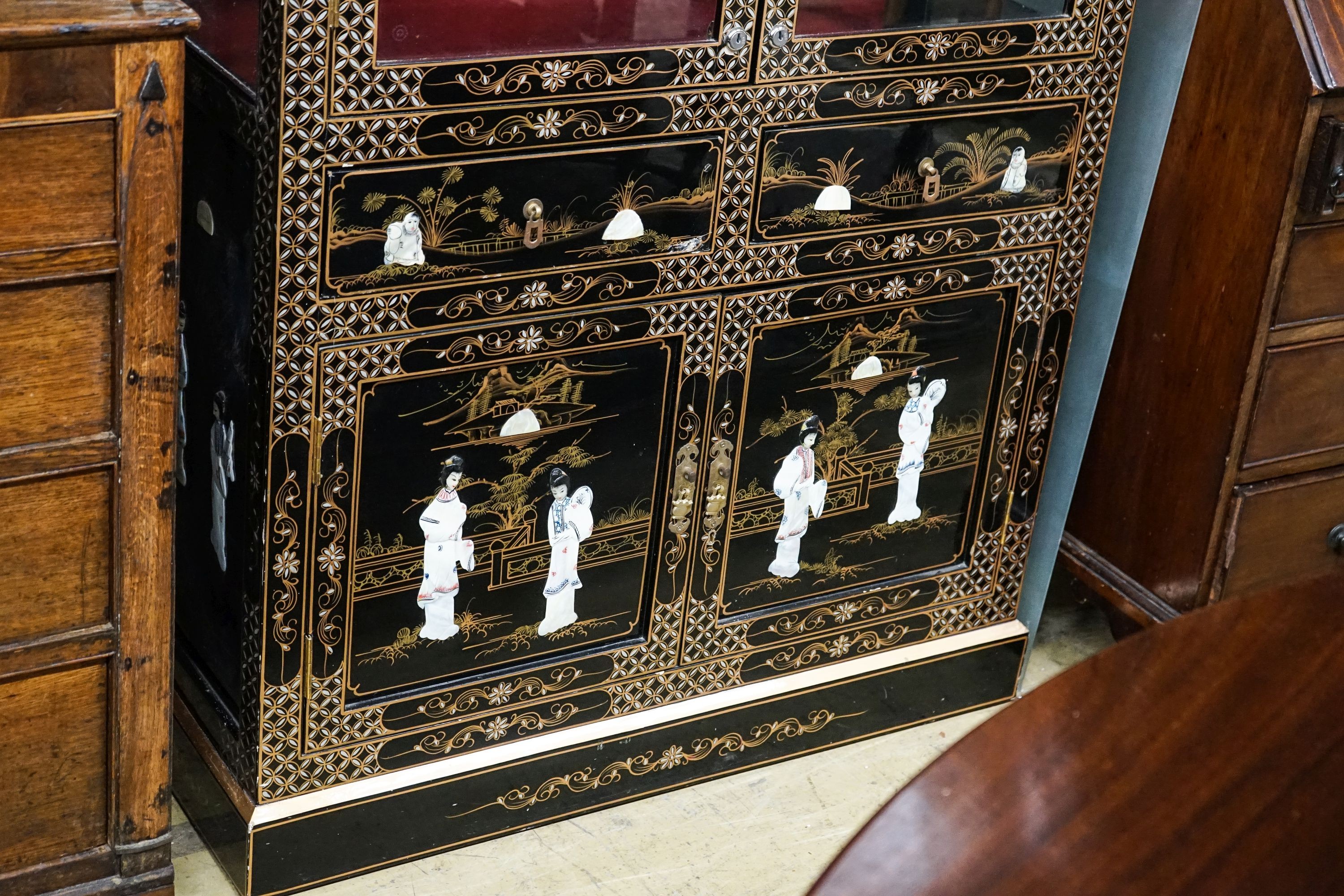 A Chinese style chinoiserie lacquer display cabinet with faux hardstone decoration, width 95cm, depth 38cm, height 183cm